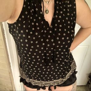 black and cream tank with tassels